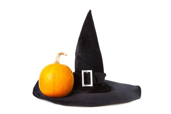 Black fabric witch hat with pumpkin for Halloween — Stock Photo, Image