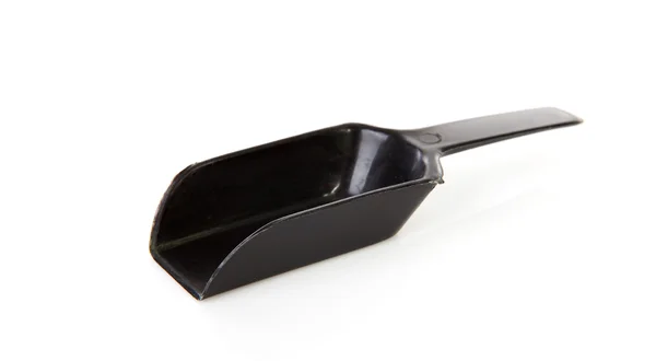 Black plastic measuring spoon — Stock Photo, Image