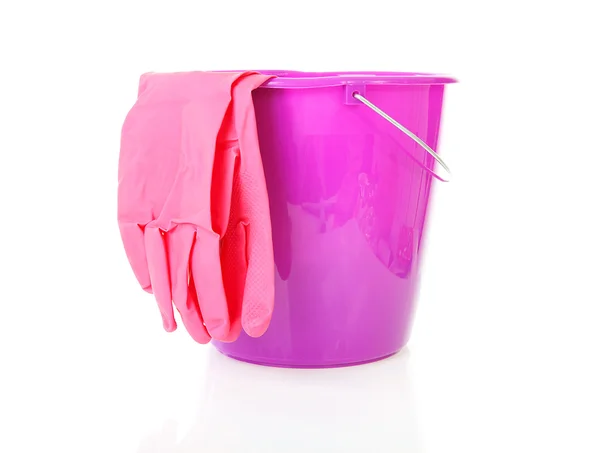 Purple bucket and household gloves — Stock Photo, Image
