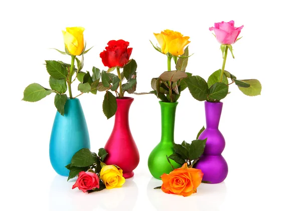 Colorful roses in vases — Stock Photo, Image
