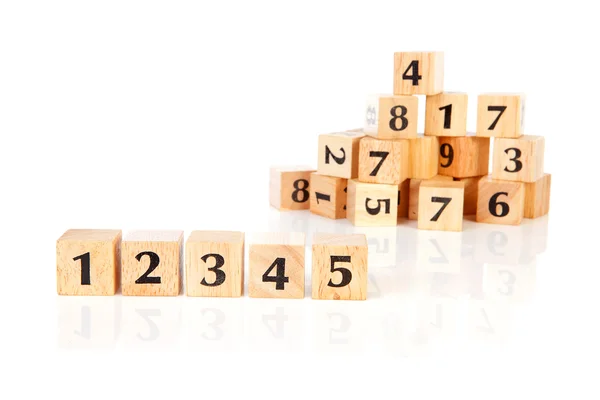 Een heleboel houten blokken met getallen — Stockfoto