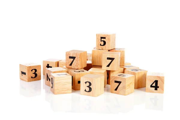 Una gran cantidad de bloques de madera con números — Foto de Stock