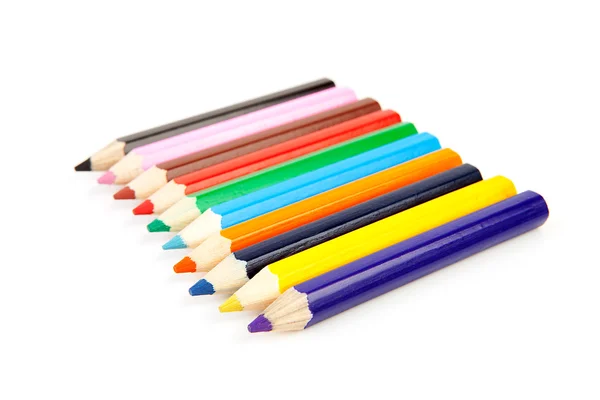 Kleurrijke potloden op een rij — Stockfoto
