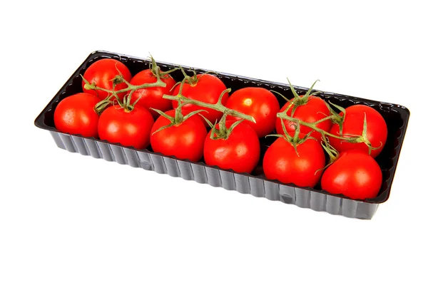 Laatikko tuoreita tomaatteja — kuvapankkivalokuva