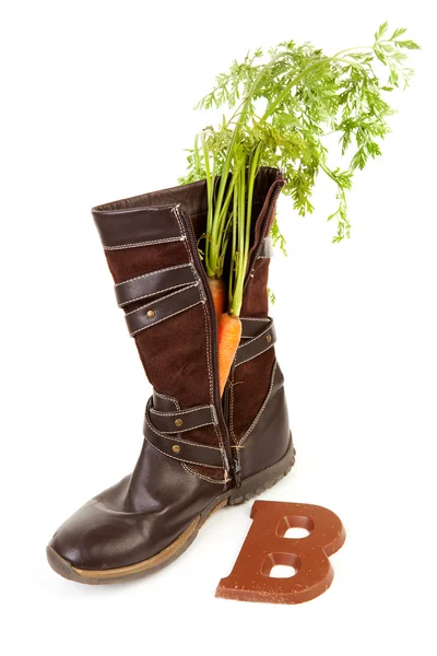 Boot with carrot for Dutch traditional feast: Sinterklaas — Stock Photo, Image
