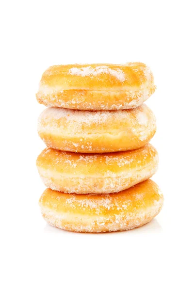 Four stacked sugared delicious donuts — Stock Photo, Image