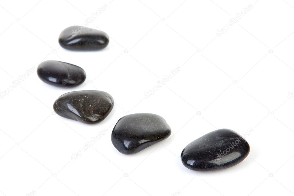 Black stepping stones in a row