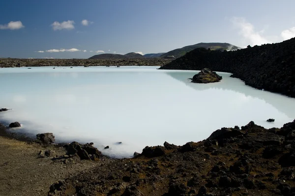 Geothermal lake in lava field — Stock Photo, Image