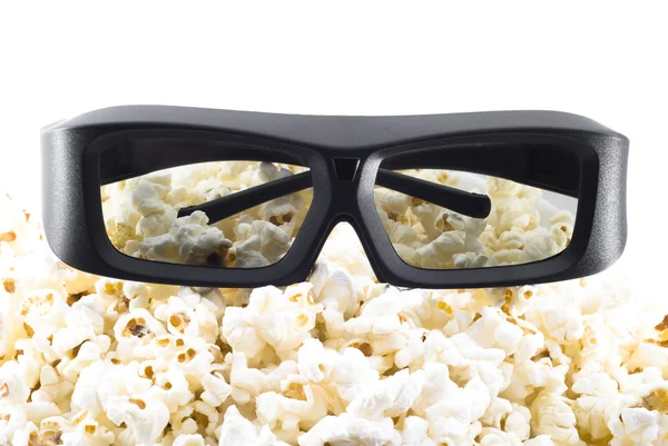 3D-Shutter-Gläser auf Popcorn Stockbild