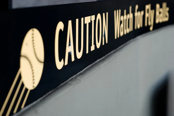 Caution watch for fly balls — Stock Photo, Image