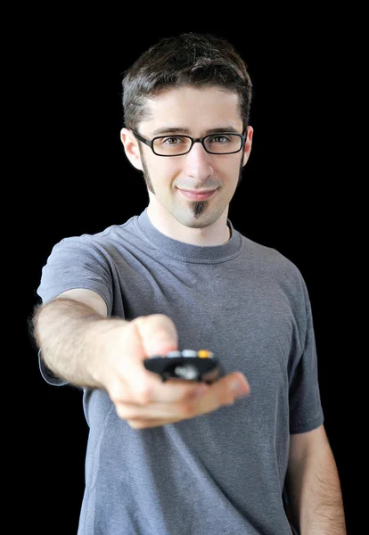 Young man using remote control — Stock Photo, Image