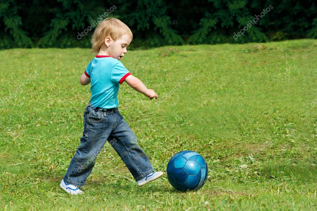 Small boy playing football in the park outdoor. Two years child — Stock ...