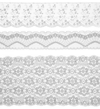 Lace trims ribbon over white. Set of embroidered fabric. Closeup clipart