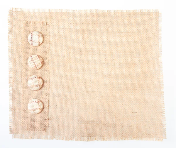 Banner de pano de saco com botões como decoração — Fotografia de Stock
