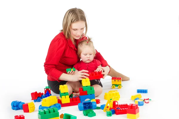 Mother playing with child over white — Stock Photo, Image