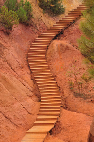 Staircase in a park inside ochre quarry, Roussillion, France