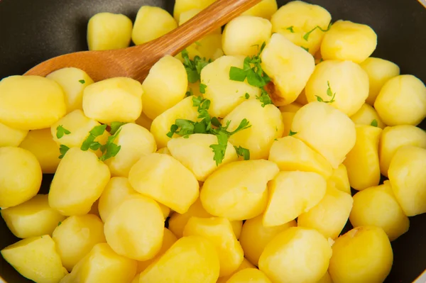 Baking new potatoes — Stock Photo, Image