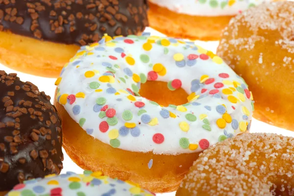 White donuts with confetti — Stock Photo, Image