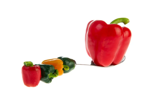 Papriky na legrační lžíce — Stock fotografie