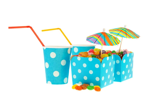 Kartony barevné bonbóny se slunečníky — Stock fotografie