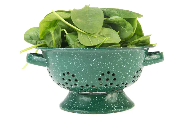 Spinach in colander — Stock Photo, Image