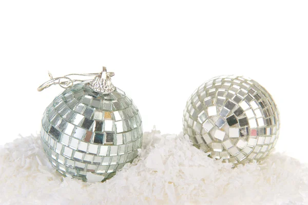 Silver Christmas balls in snow — Stock Photo, Image