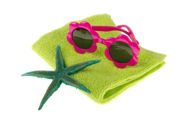 Green towel and sunglasses for the beach — Stock Photo, Image