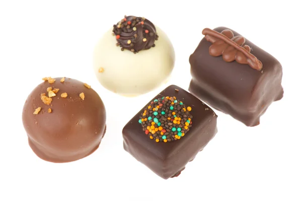 Chocolates brancos e castanhos — Fotografia de Stock