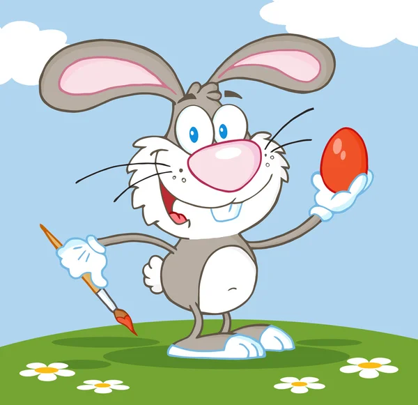 Gray Easter Bunny Painting An Egg Outside — Stock Photo, Image