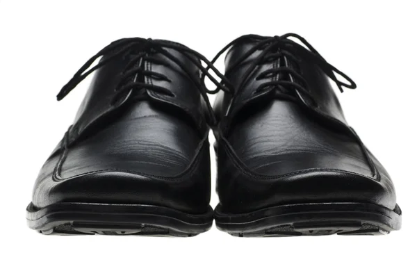 Чёрные туфли человека-пары — стоковое фото