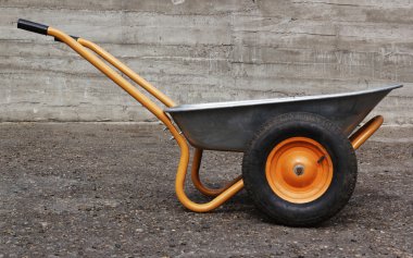 Orange two weel wheelbarrow clipart