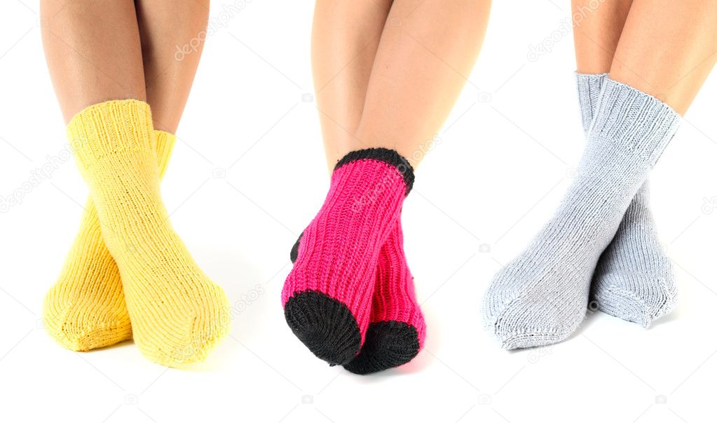 Woman legs in woollen socks.
