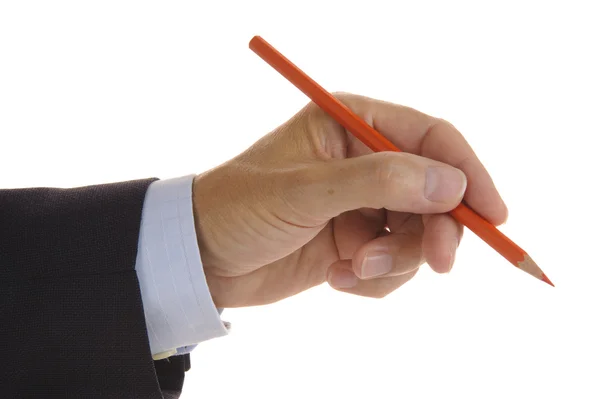 Κόκκινο μολύβι στο χέρι των επιχειρήσεων — Φωτογραφία Αρχείου