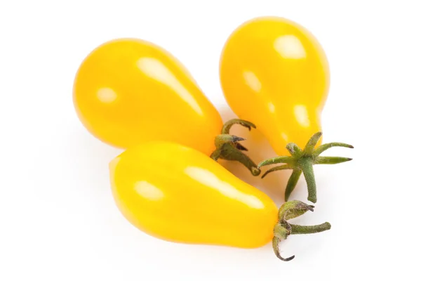 Желтые помидоры на белом фоне — стоковое фото