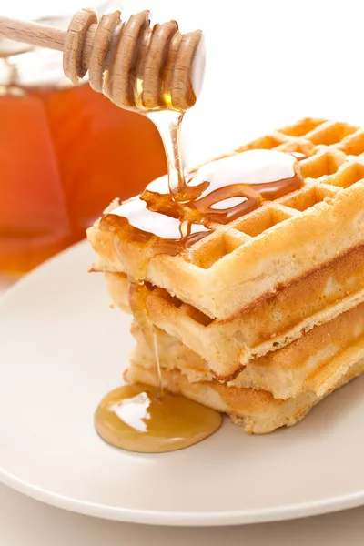 Waffle with honey — Stock Photo, Image