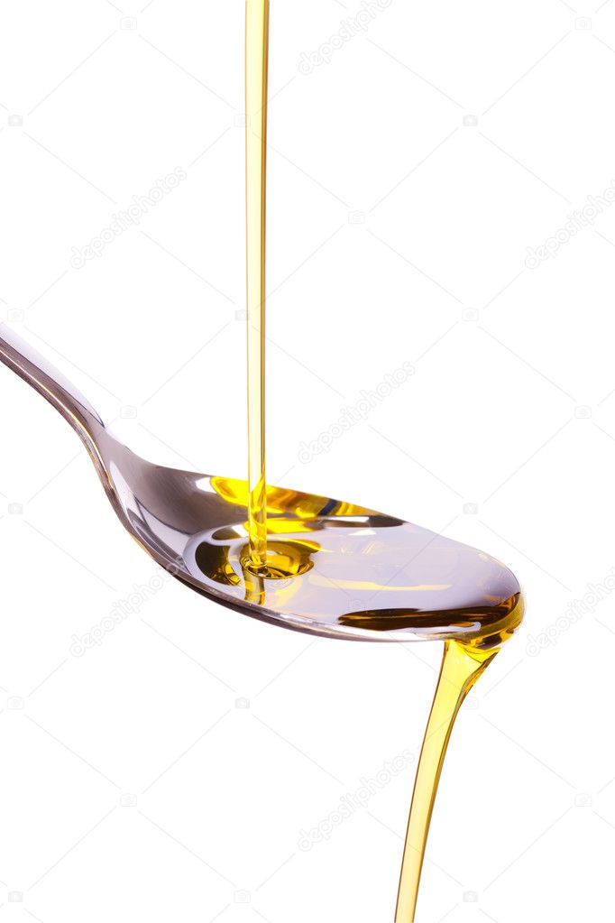 Olive oil poured into spoon Stock Photo by ©jirkaejc 6998549