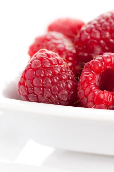 Raspberries in bowl — Stock Photo, Image