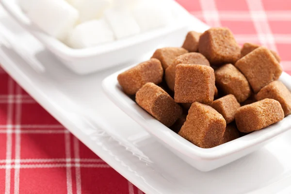 Brown and white cubes of sugar — Stock Photo, Image