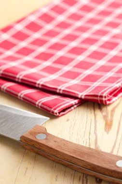 Checkered napkin and knife clipart