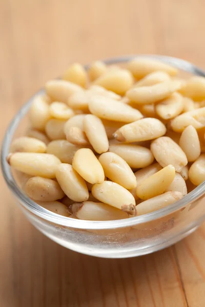 Pine nuts in bowl — Stock Photo, Image