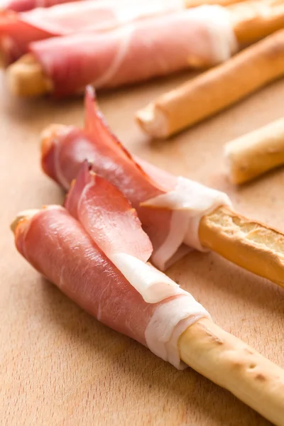 stock image Grissini sticks with ham