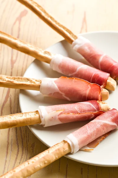 stock image Grissini sticks with ham