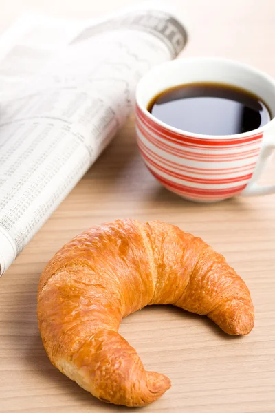 Breakfast with newspaper — Stock Photo, Image