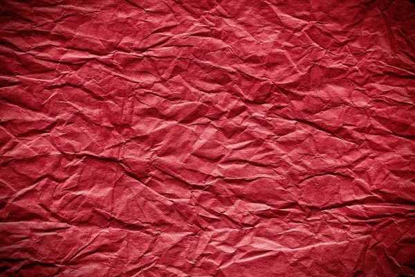 Roter zerknitterter Papierhintergrund — Stockfoto