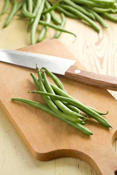 Bean pods with knife — Stock Photo, Image