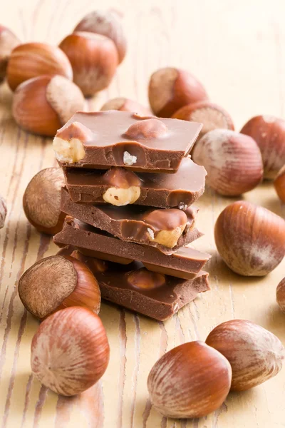 Tasty chocolate with hazelnuts — Stock Photo, Image