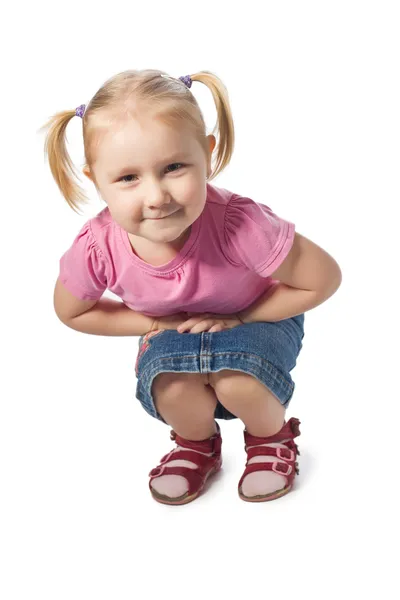 Sitzendes kleines Mädchen — Stockfoto