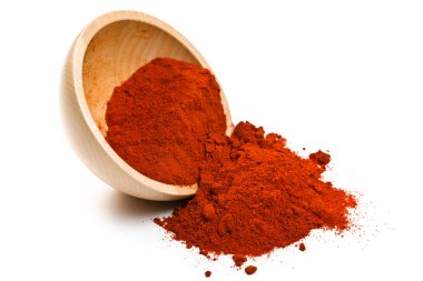 Paprika powder in wooden bowl clipart