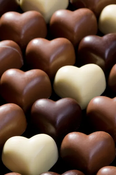 Chocolate hearts background — Stock Photo, Image