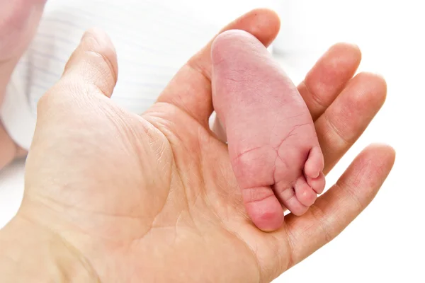 Нога новонародженої дитини — стокове фото